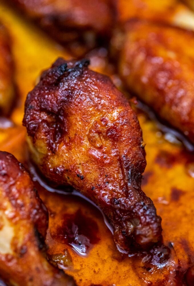 honey garlic chicken wings on a baking sheet