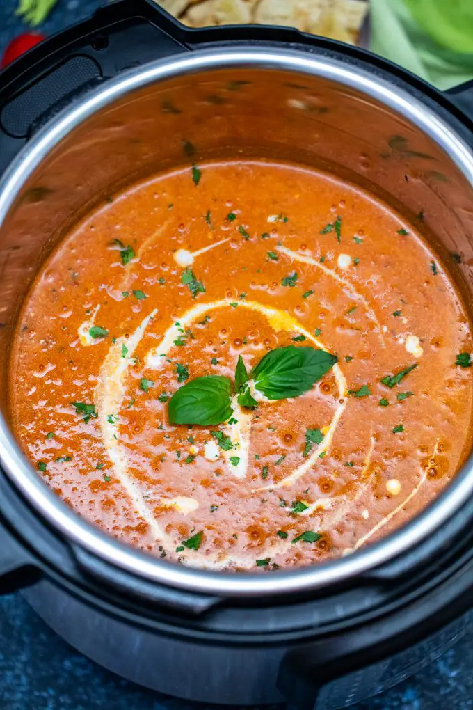 Instant Pot Tomato Bisque is so easy to prepare - the best when you are in a hurry. #instantpot #pressurecookes #instantpotrecipes #sweetandsavorymeals #souprecipes #tomatobisque