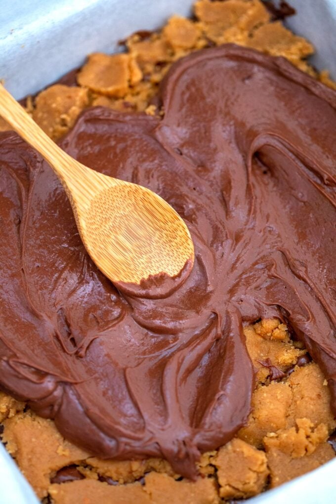 Peanut Butter Brownies are chewy, moist, and made rich with a layer of peanut butter filling! #brownies #peanutbutter #brownierecipe #sweetandsavorymeals #dessertrecipes
