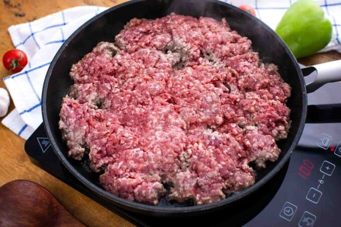 searing beef in a cast iron skillet