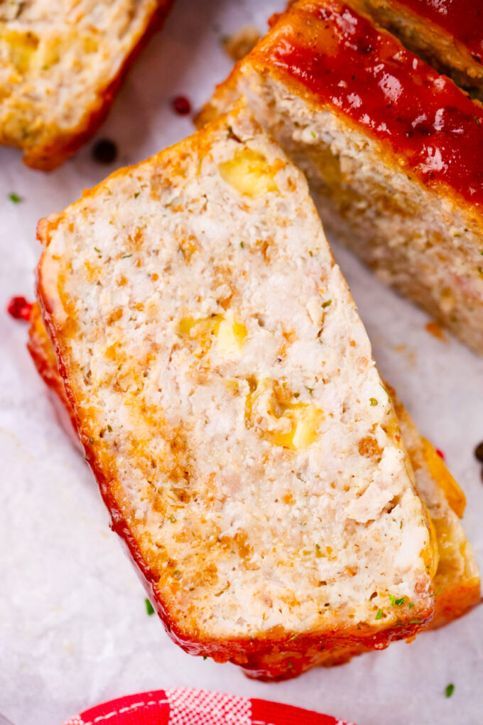 Overhead shot of cheesy turkey meatloaf with Pepper Jack cheese.