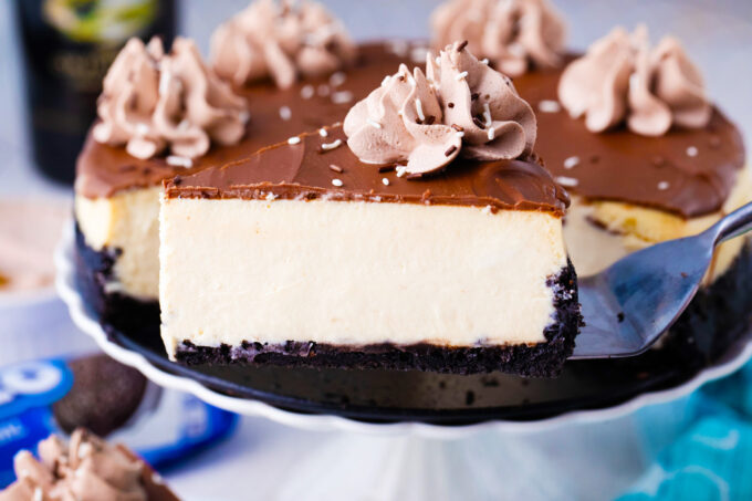 Triple Bailey's cheesecake with chocolate ganache and whipped cream.
