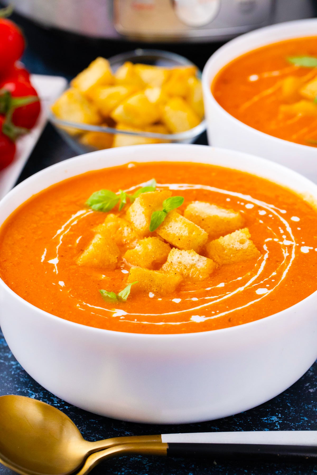 A bowl of very creamy, homemade Instant Pot tomato bisque.