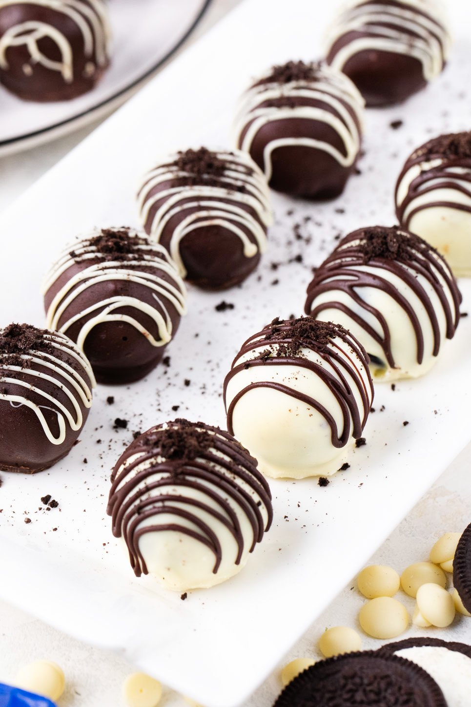 Oreo balls arranged on a plate.