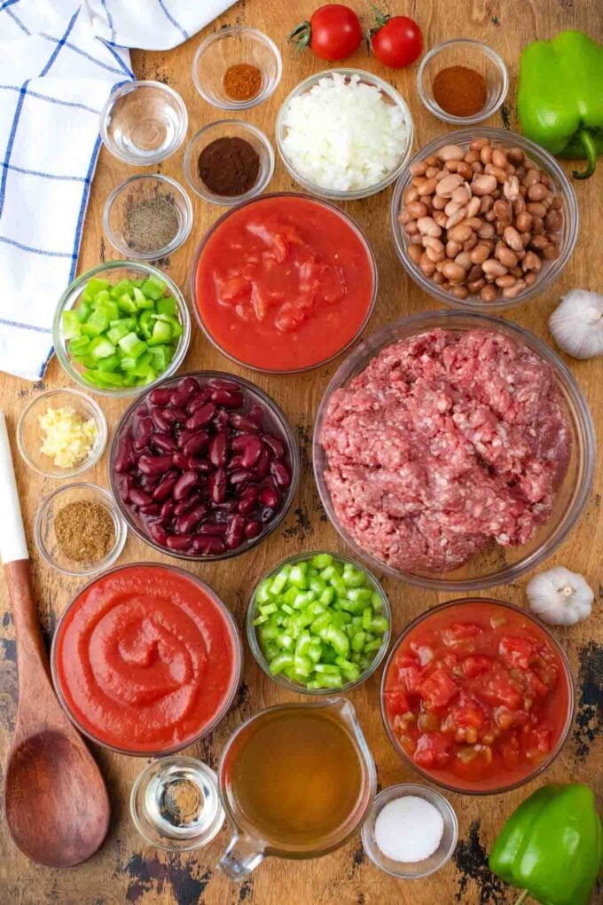 slow cooker Wendy's chili ingredients in bowls on a table