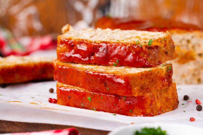 Stacked slices of glazed turkey meatloaf with Pepper Jack cheese.