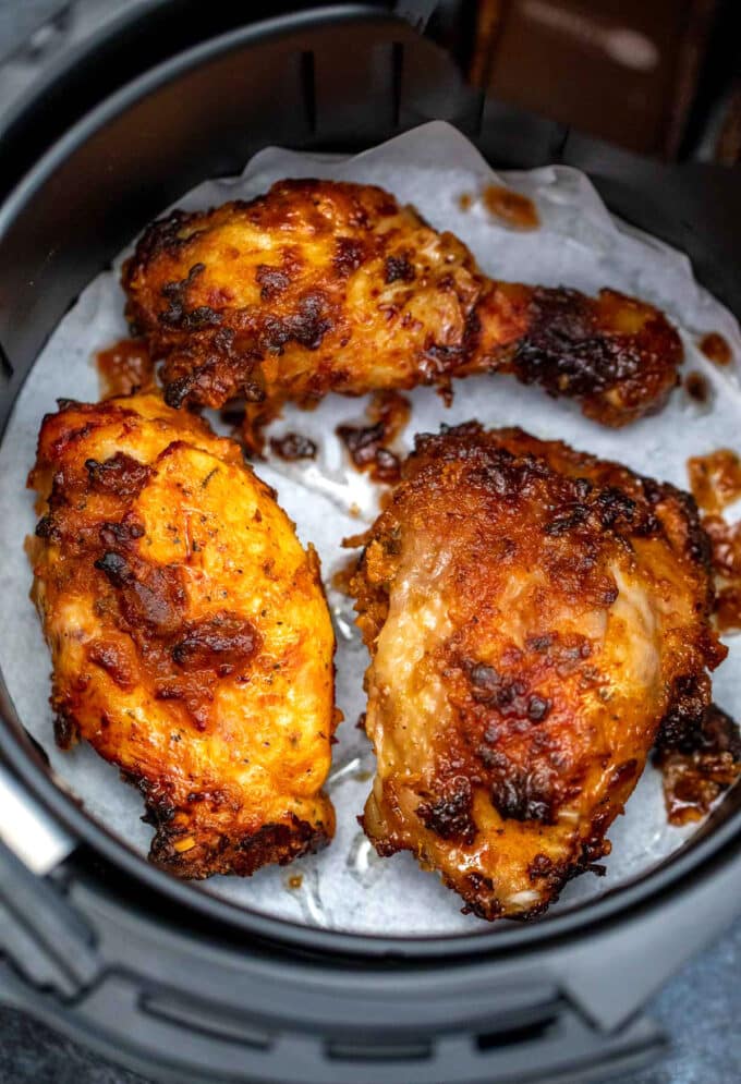 perfectly crispy fried chicken in the air fryer basket