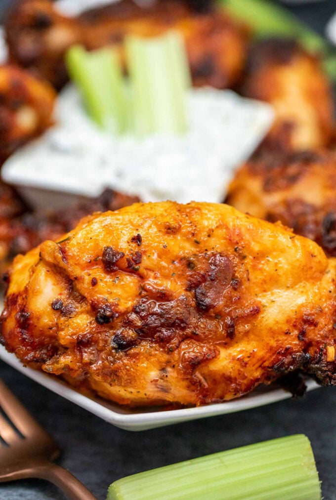 Air fryer fried chicken next to a dipping sauce