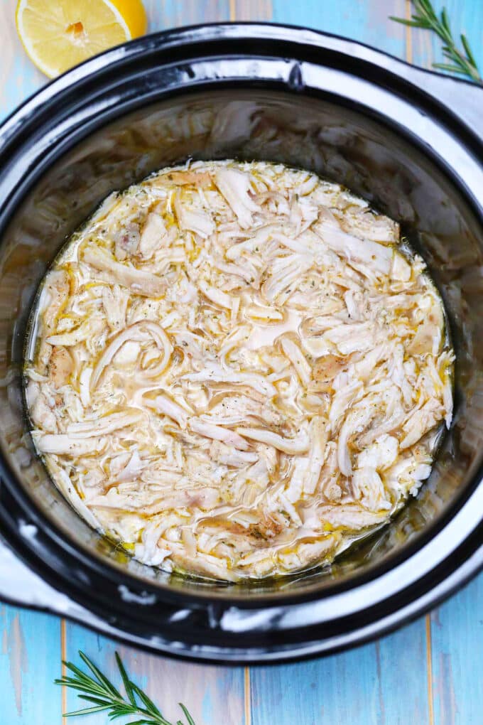 photo of shredded chicken breasts in the slow cooker