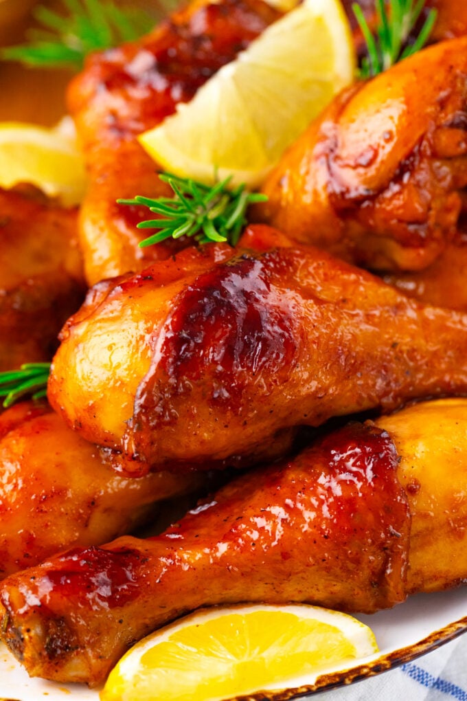 Close shot of crispy baked chicken legs.