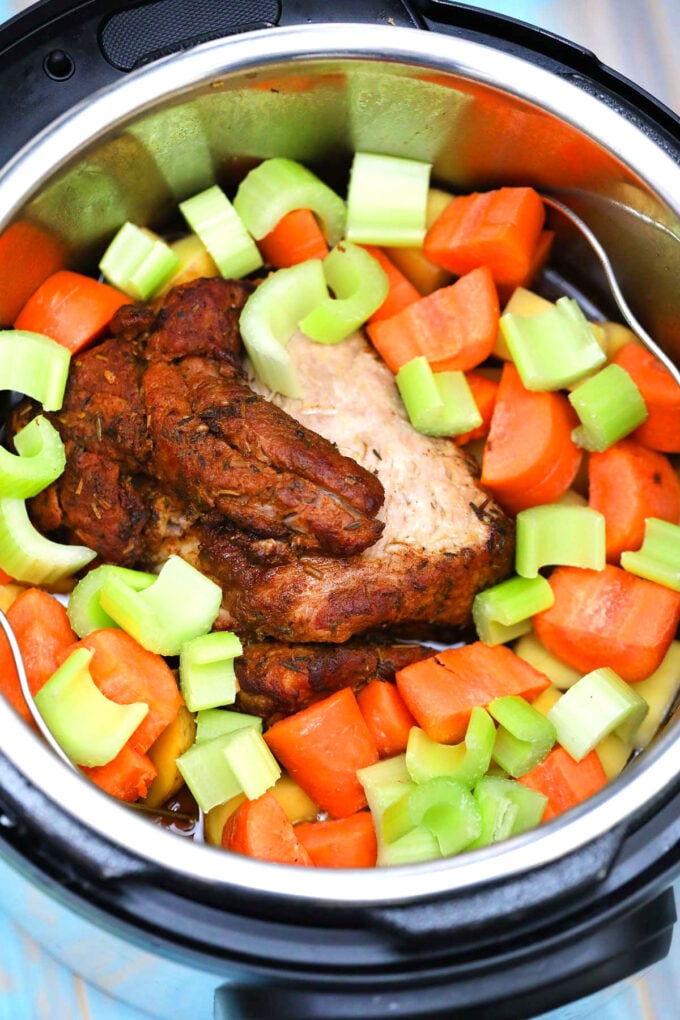 image of pork shoulder and veggies in the instant pot
