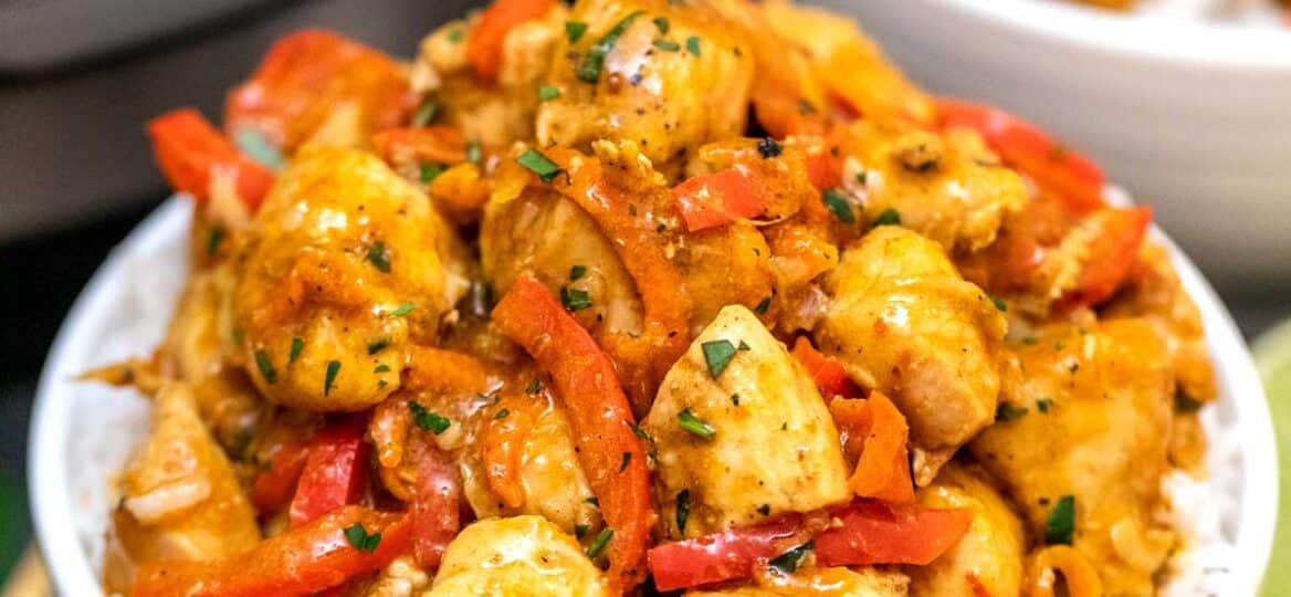 image of instant pot coconut curry chicken in white bowls