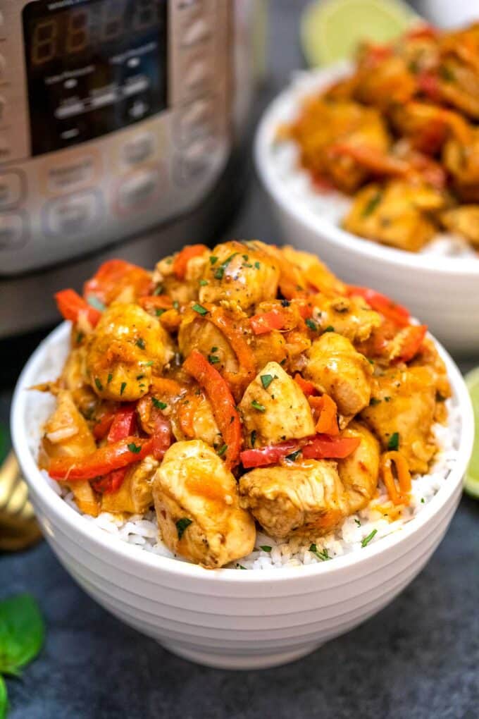 image of instant pot coconut curry chicken in white bowls