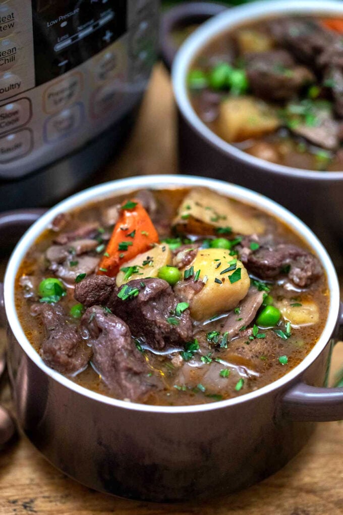 instant pot lamb stew in serving bowls