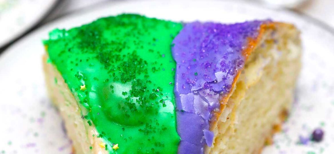 image of king cake slice with purple and green glaze