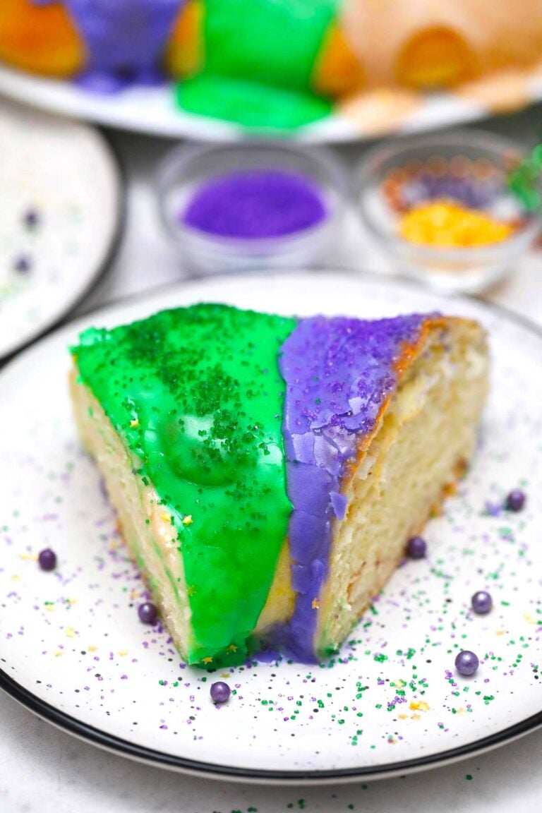 image of king cake slice with purple and green glaze