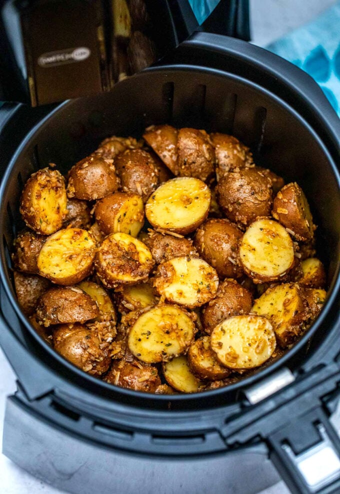 seasoned potatoes cooking in the air fryer