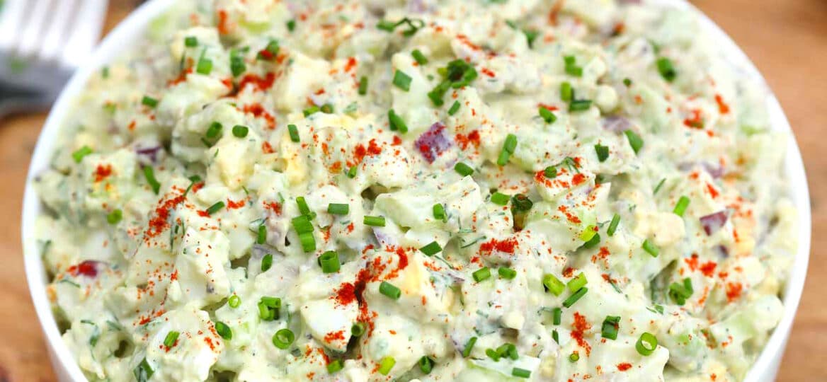 Image of bowl with avocado egg salad.