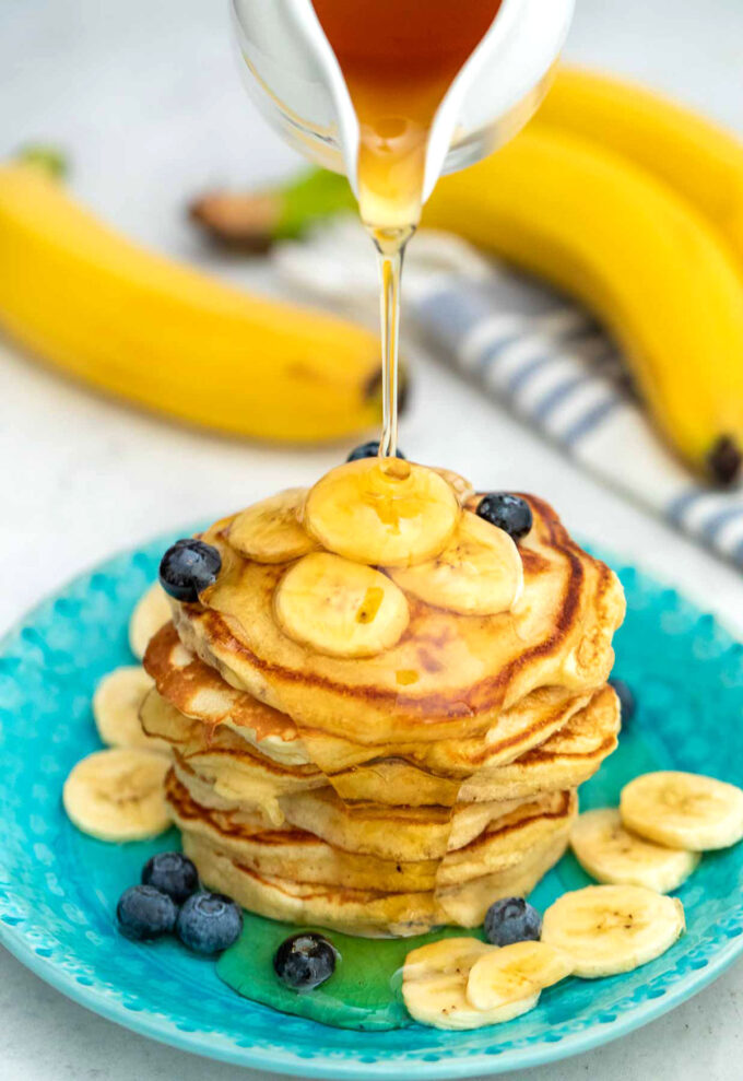 photo of maple syrup drizzled pancakes