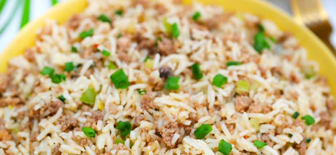 image of dirty rice served with green onions