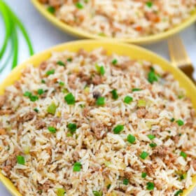 image of dirty rice served with green onions