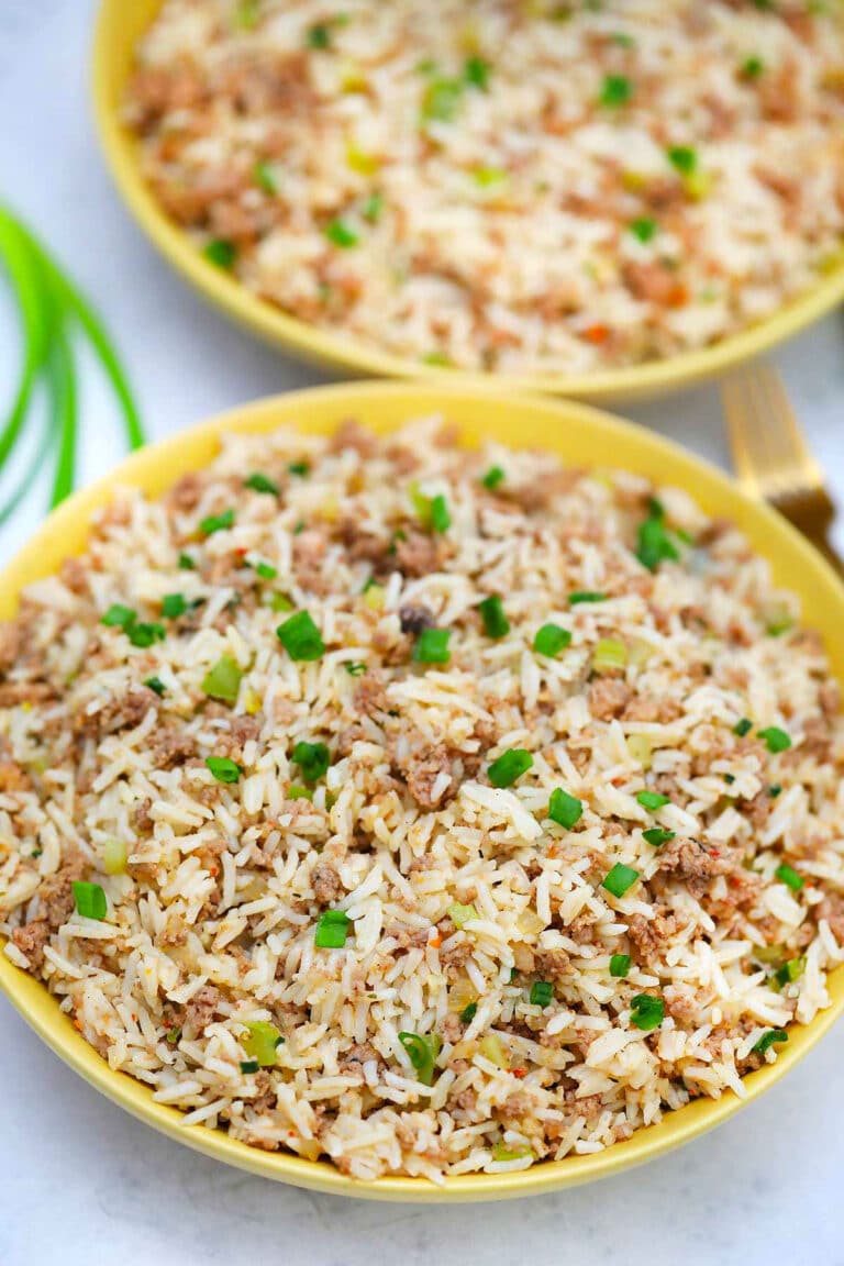 image of dirty rice served with green onions