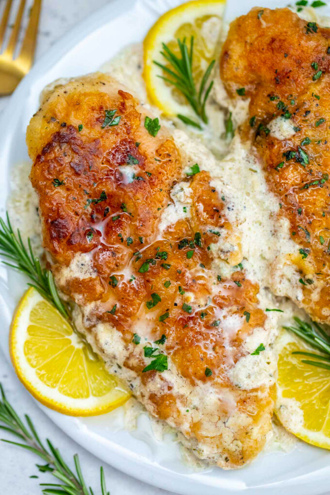 Image of homemade chicken francese with lemon and rosemary.