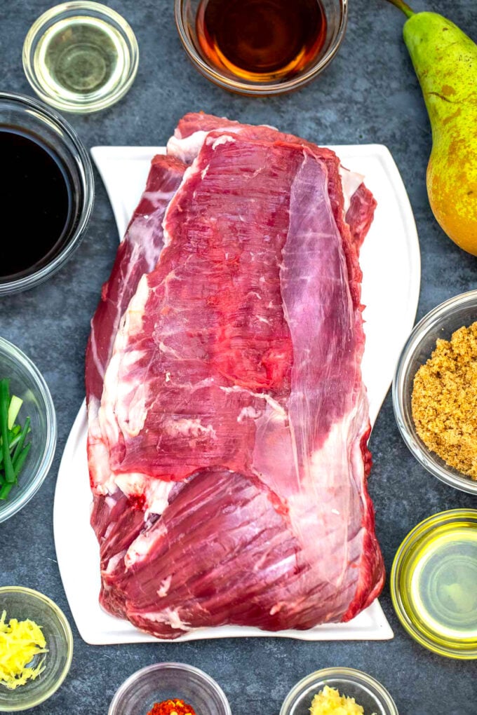 Ingredients for beef bulgogi recipe and a piece of flank steak