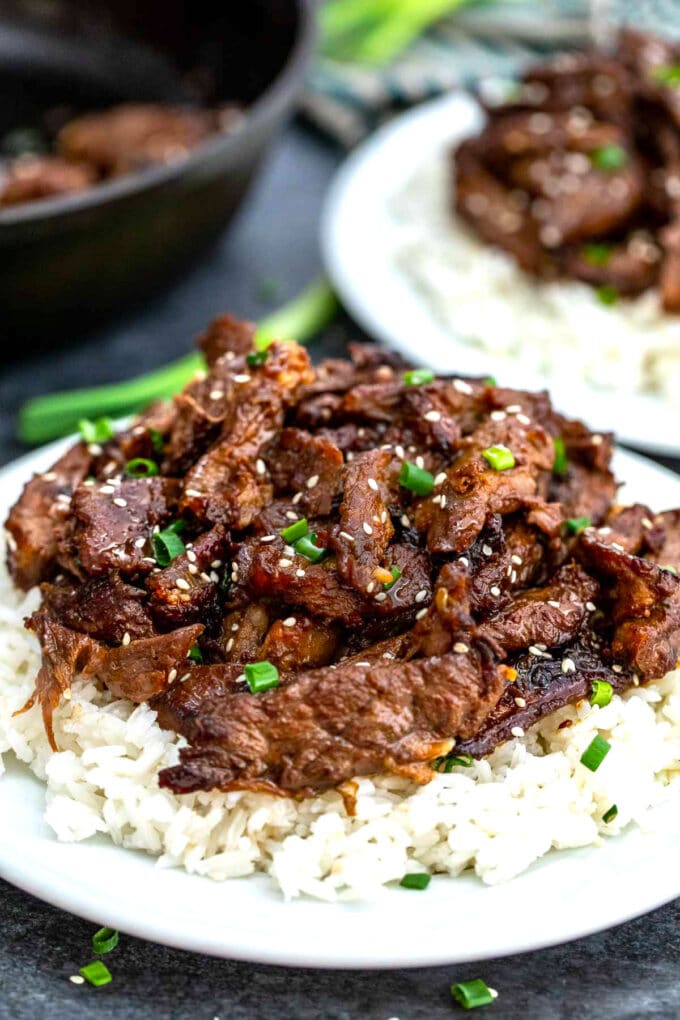 Homemade Korean Beef Bulgogi on a bowl of white rice.