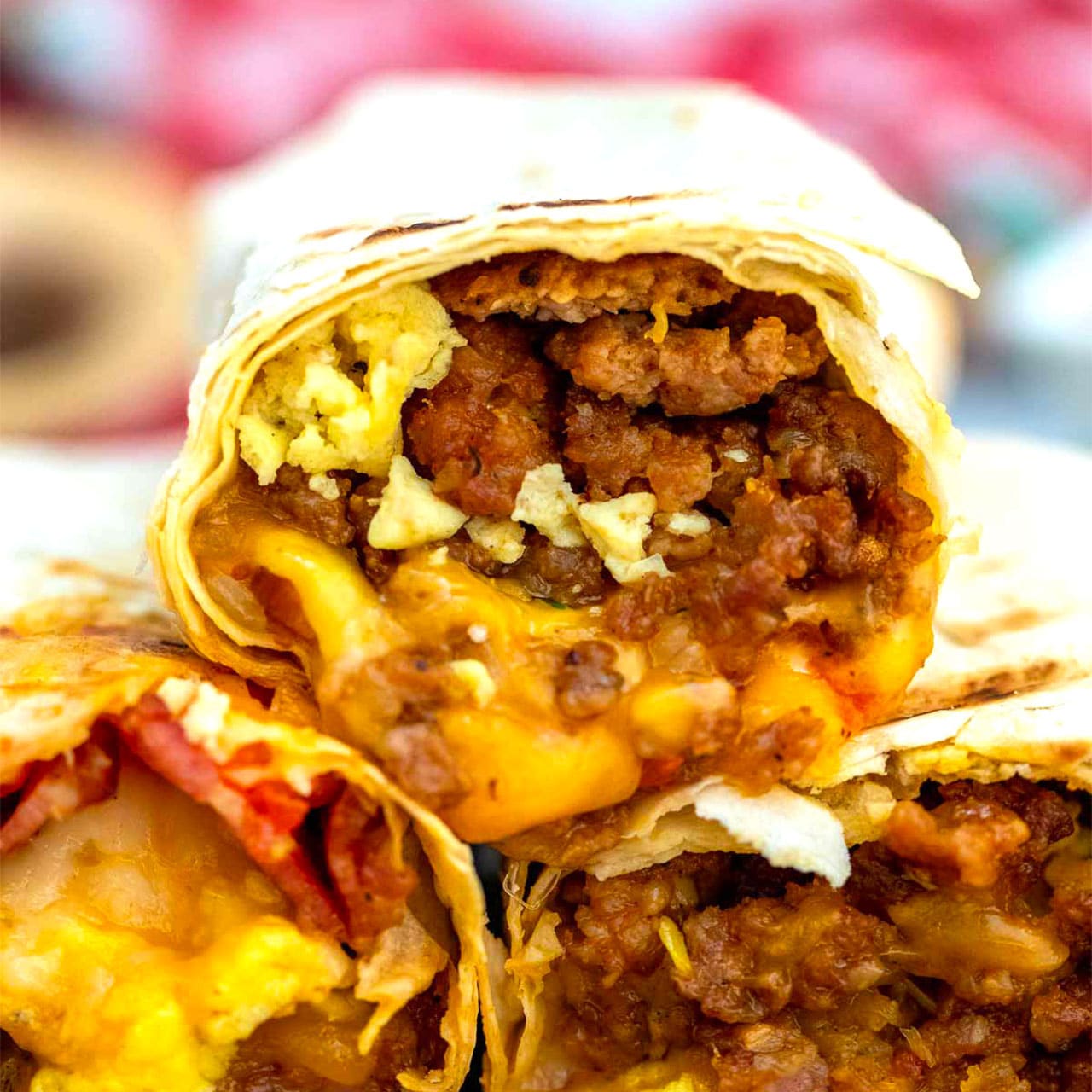Sausage Egg and Cheese Breakfast Burrito [Video] - Sweet and Savory Meals