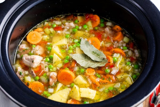 Slow cooker chicken stew ingredients in the crockpot.
