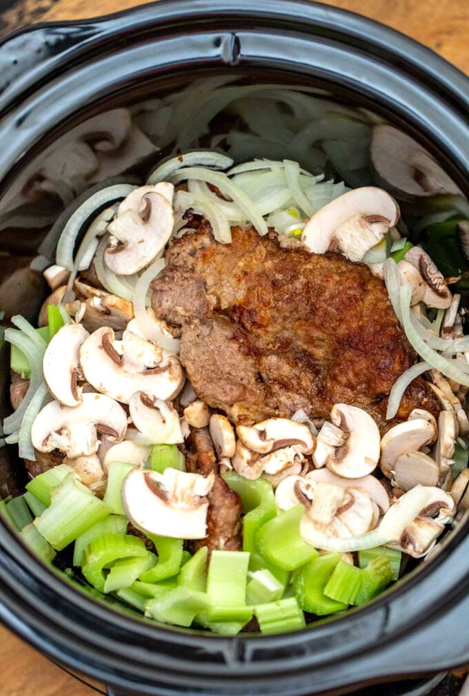 image of steak and veggies in the slow cooker