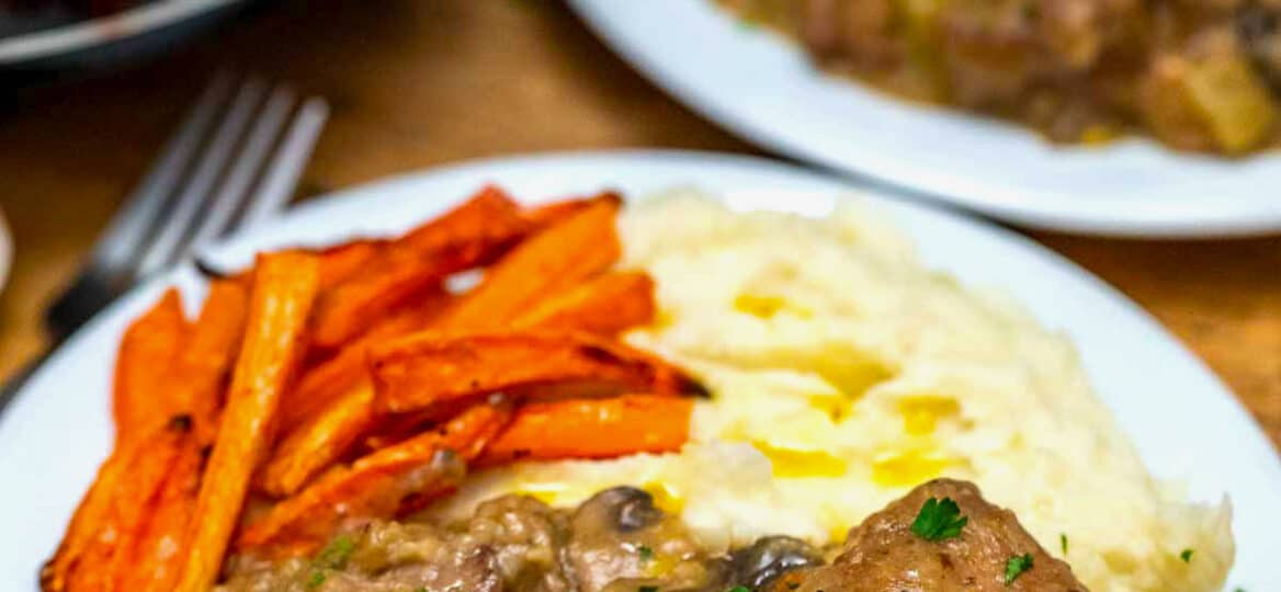 photo of slow cooker Swiss steak with mashed potatoes