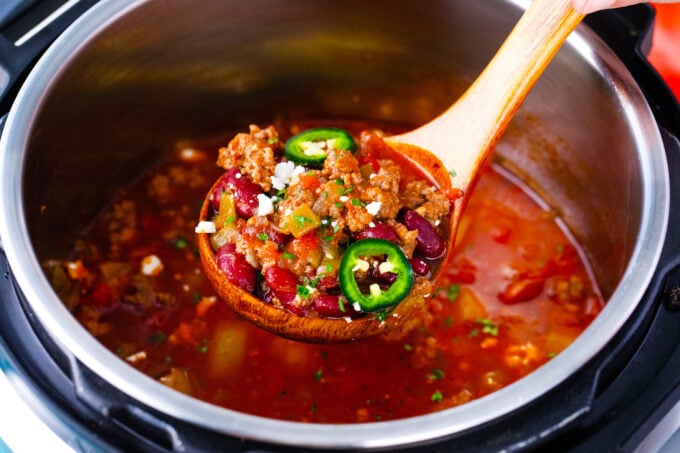 A ladle of hearty Instant Pot taco soup.