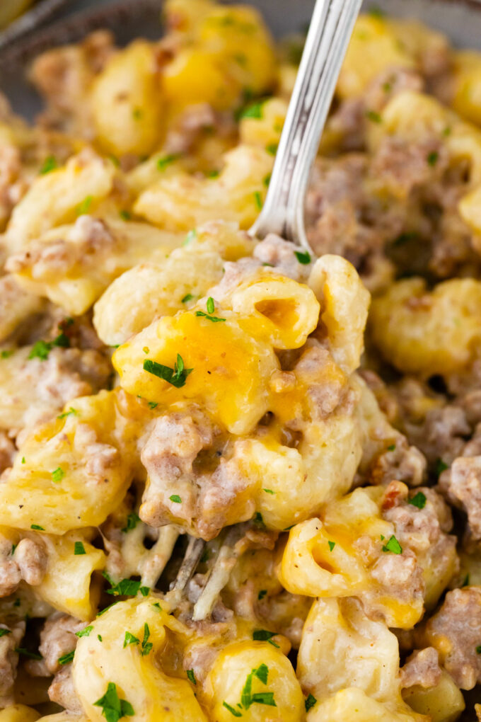 A forkful of cheesy Instant Pot cheeseburger macaroni.