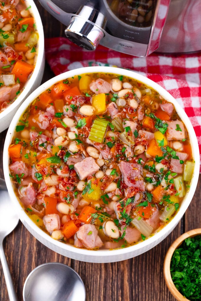 Overhead shot of Instant Pot ham and bean soup with veggies.