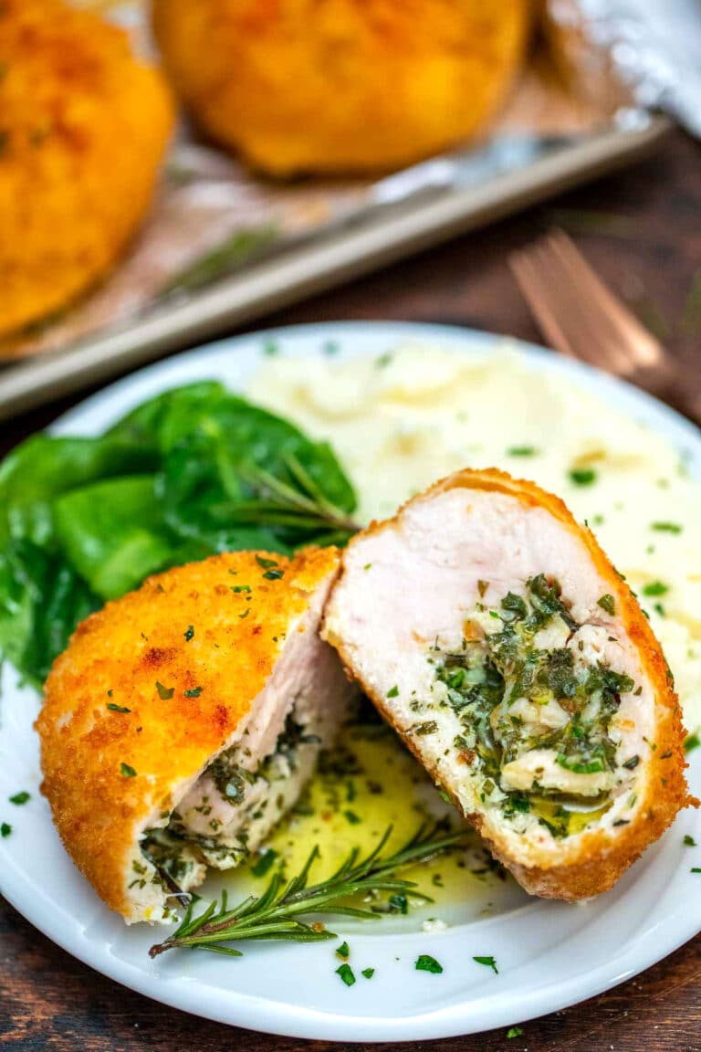 Picture of chicken Kiev sliced in half.