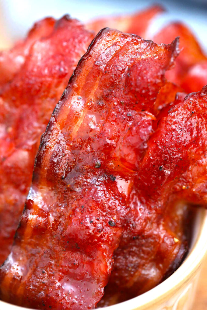 Photo of crispy candied bacon with brown sugar.