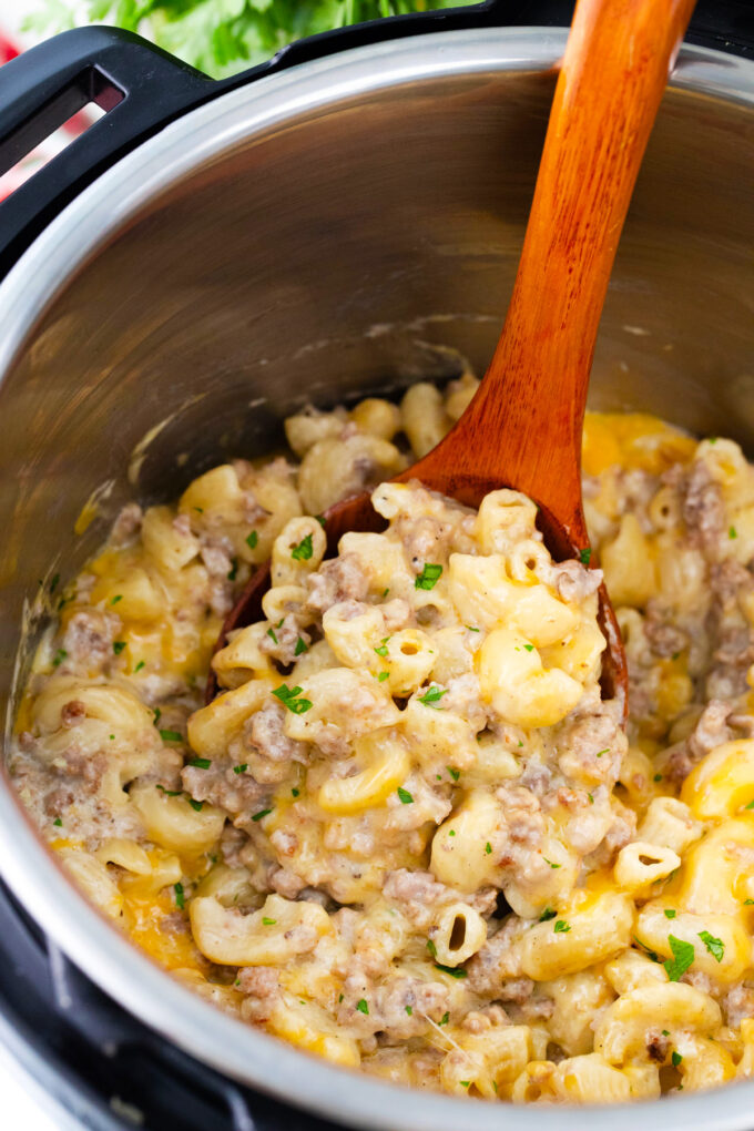 A ladle of Instant Pot cheeseburger macaroni.