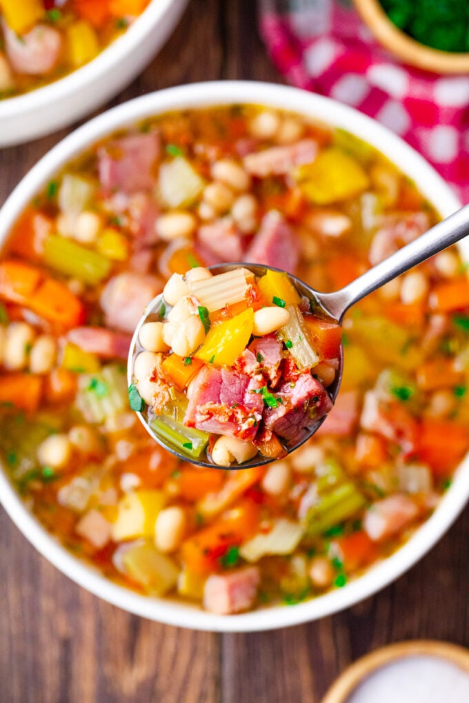 A spoonful of Instant Pot ham and bean soup.