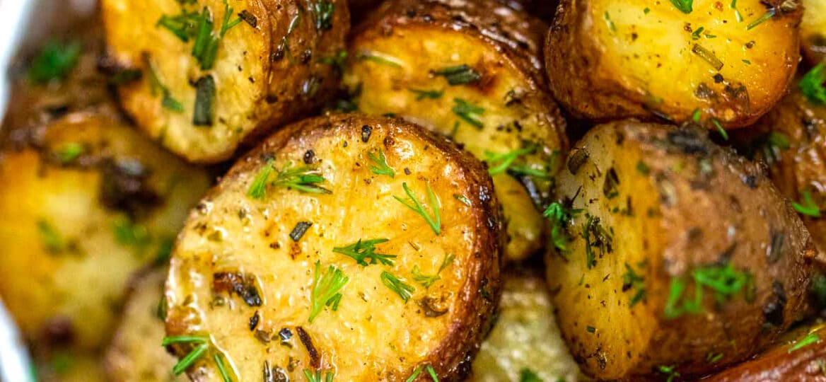 Picture of oven roasted baby red potatoes with fresh parsley.