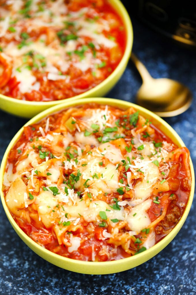 Image of lasagna soup in a yellow bowl.