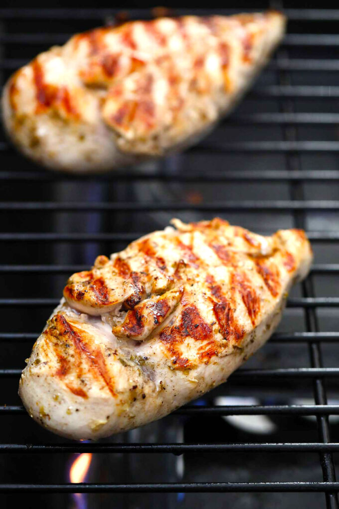 Photo of chicken breasts on the grill.