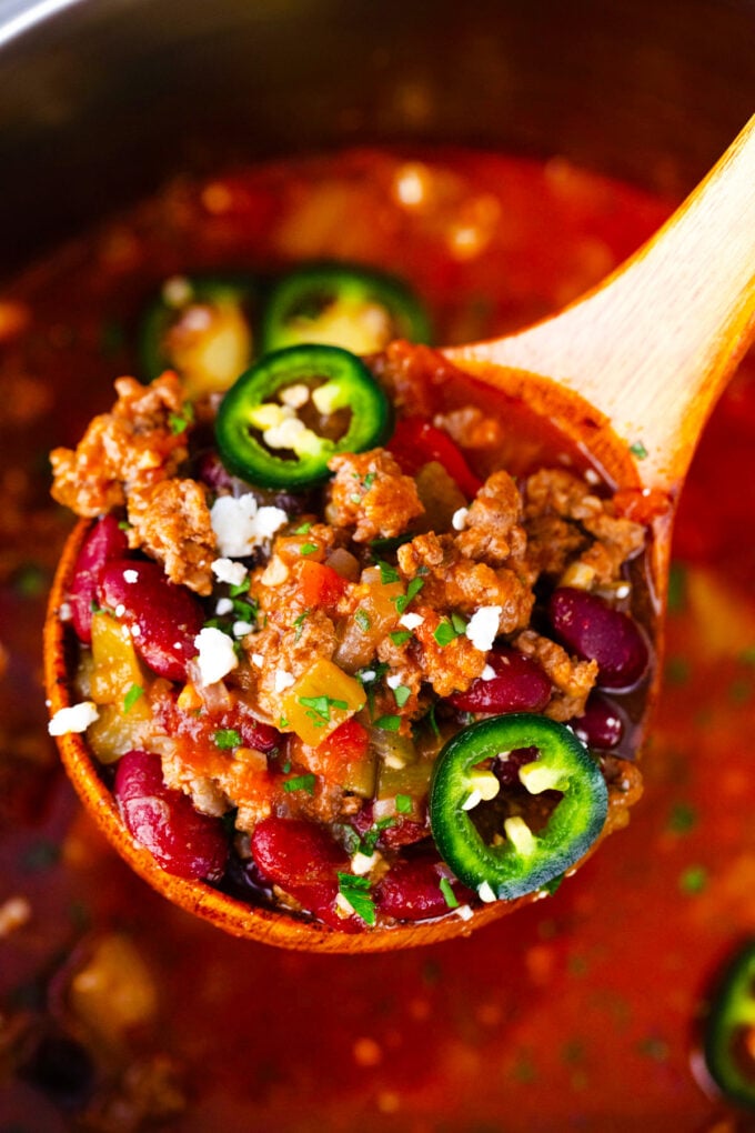 A ladle of beefy Instant Pot taco soup.