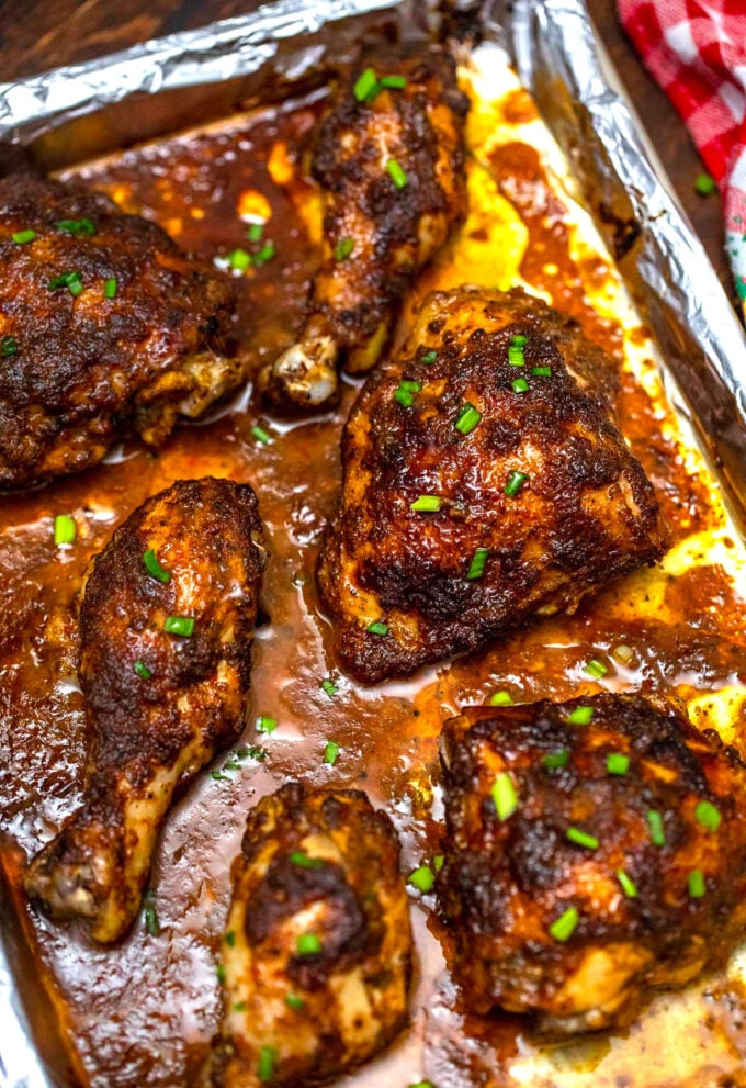 Image of baked jerk chicken thighs.