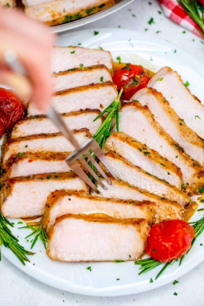 Sliced maple syrup and apple cider vinegar boneless pork chops.