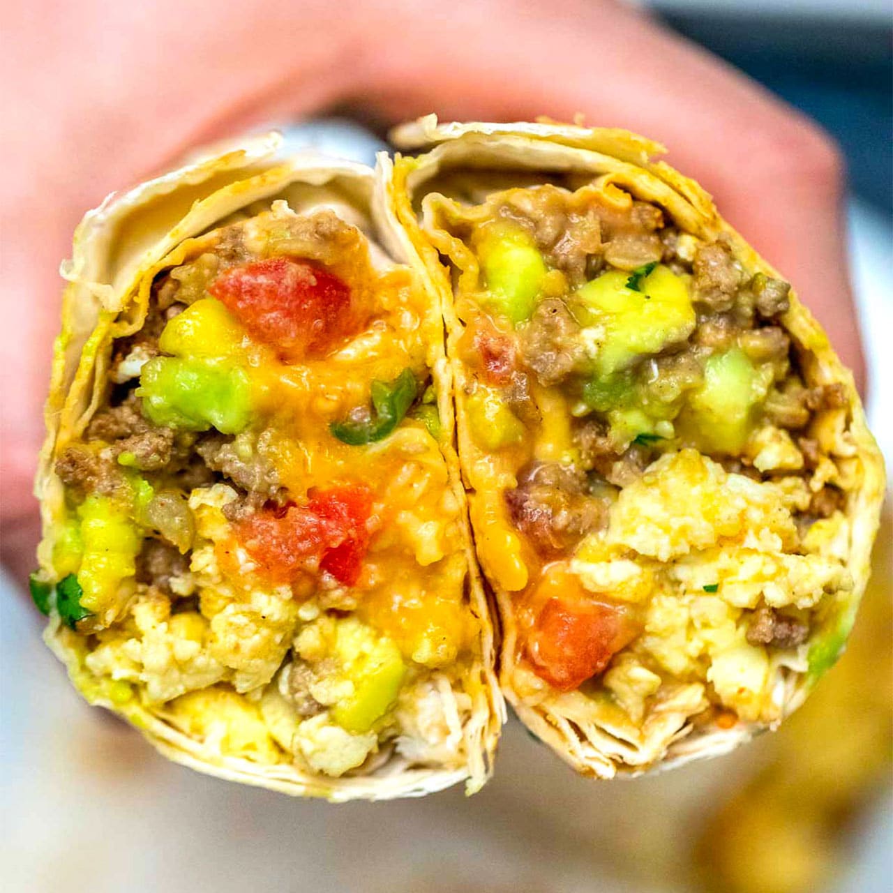 https://sweetandsavorymeals.com/wp-content/uploads/2020/04/mexican-breakfast-burrito-facebook.jpg