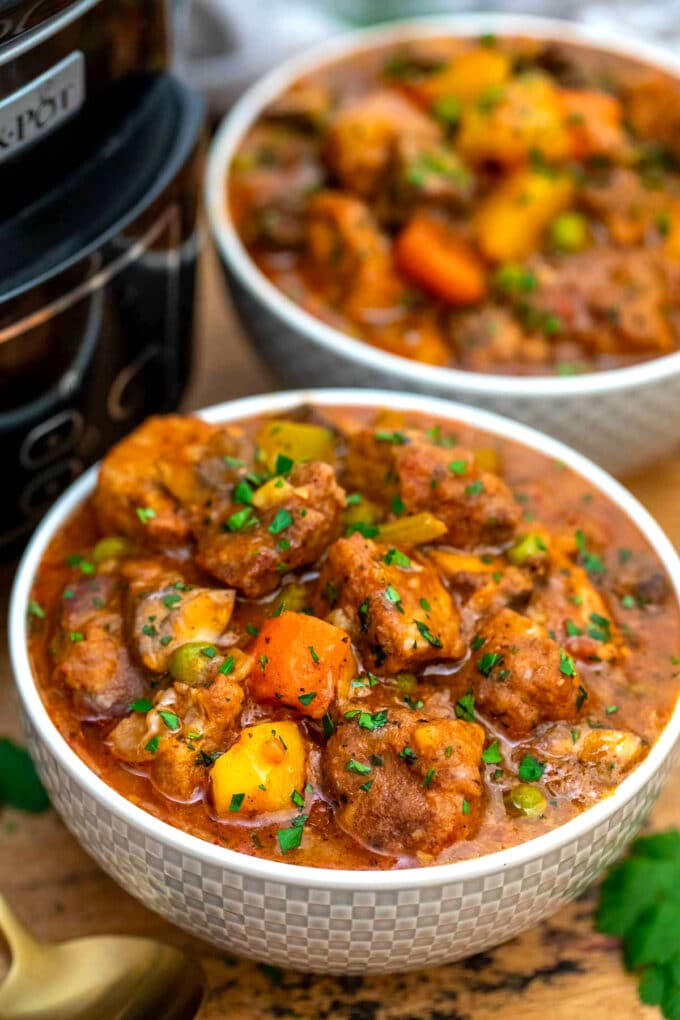 two bowls of crockpot pork stew