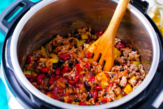Instant Pot taco soup ingredients in the pressure cooker.