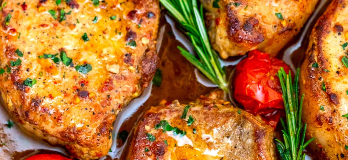 Image of skillet pork chops in sauce.